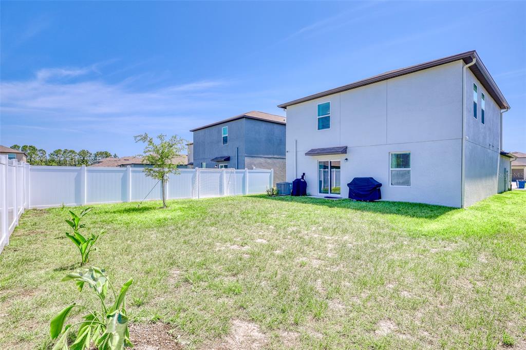 111 Rain Lily Ave Spring Hill Spring Hill, FL 34609 - Photo 26 of 60 a view of outdoor space and yard