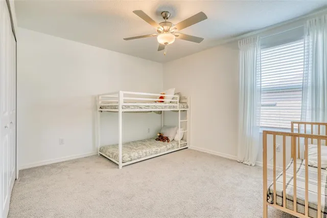 a view of a livingroom with a ceiling fan