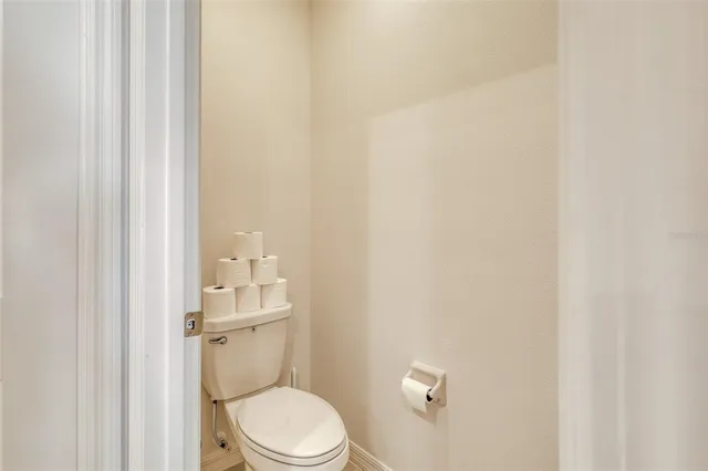 an aerial view of a houses with a swimming pool