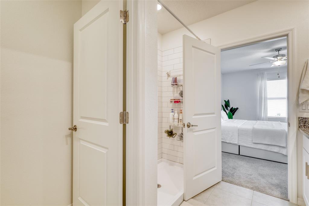 111 Rain Lily Ave Spring Hill Spring Hill, FL 34609 - Photo 41 of 60 a bathroom with a bathtub sink and mirror