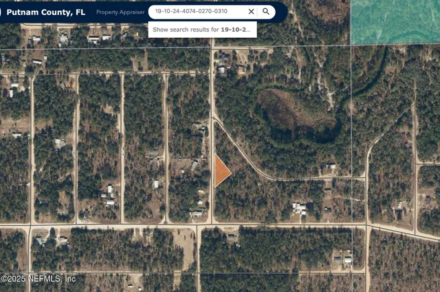 a bathroom with a mirror and a shower