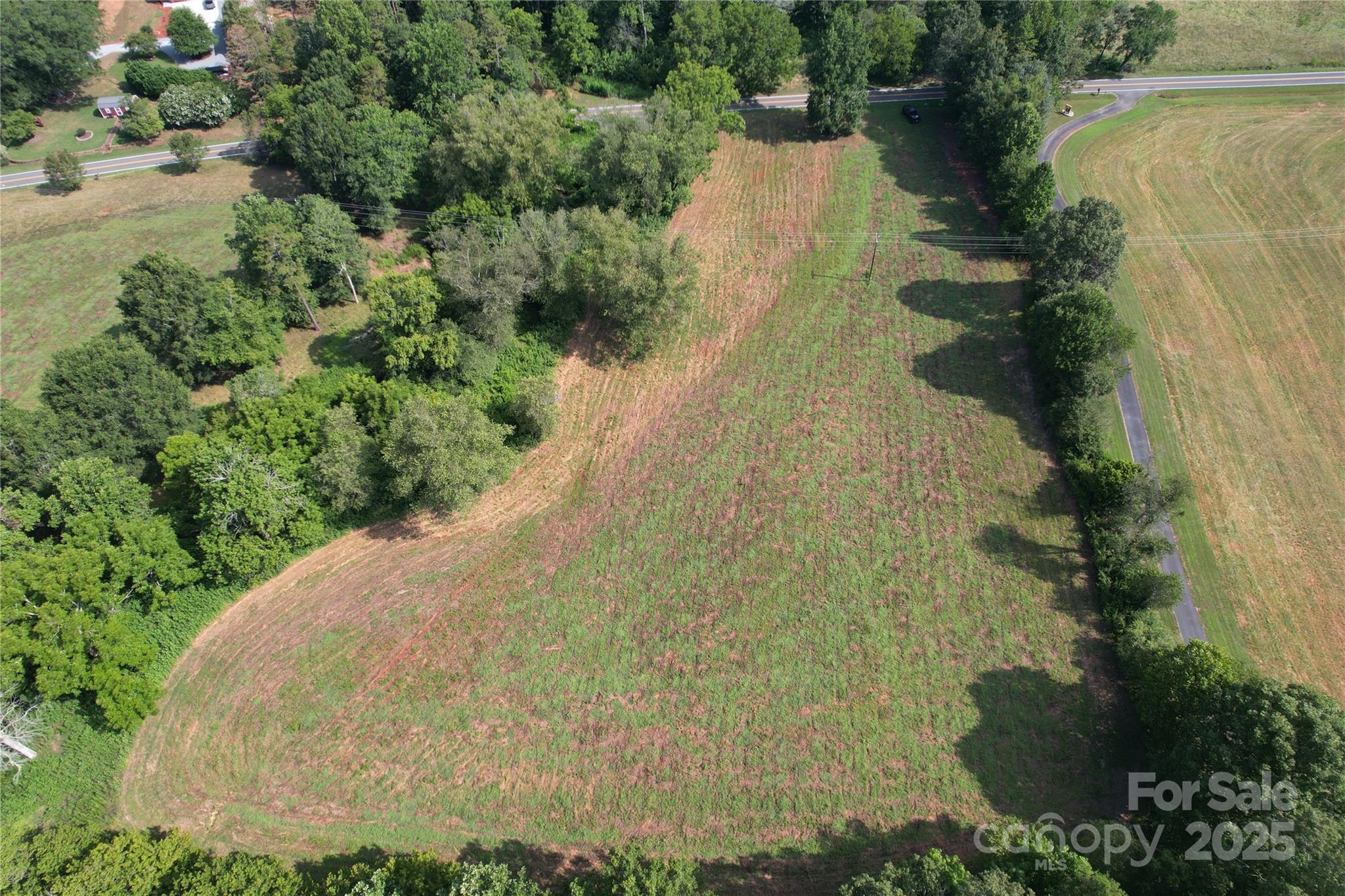 0 Old Belwood Road Lawndale, NC 28090 - Photo 16 of 23 a view of a lake with a yard