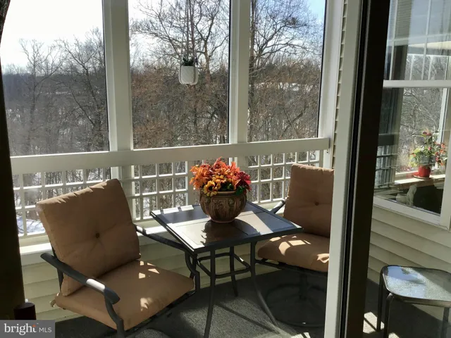 a view of a chairs in a balcony