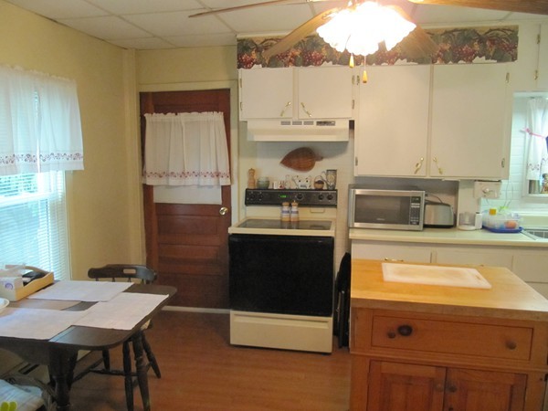 25 Fowler Road Northbridge, MA 01534 - Photo 12 of 30 a kitchen with a sink and cabinets