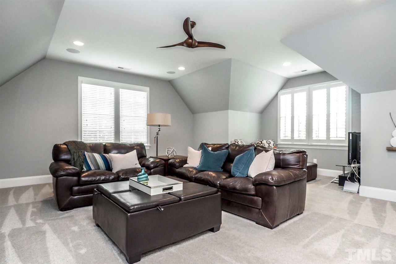 5005 Rampart Street Raleigh, NC 27609 - Photo 21 of 25 a living room with furniture