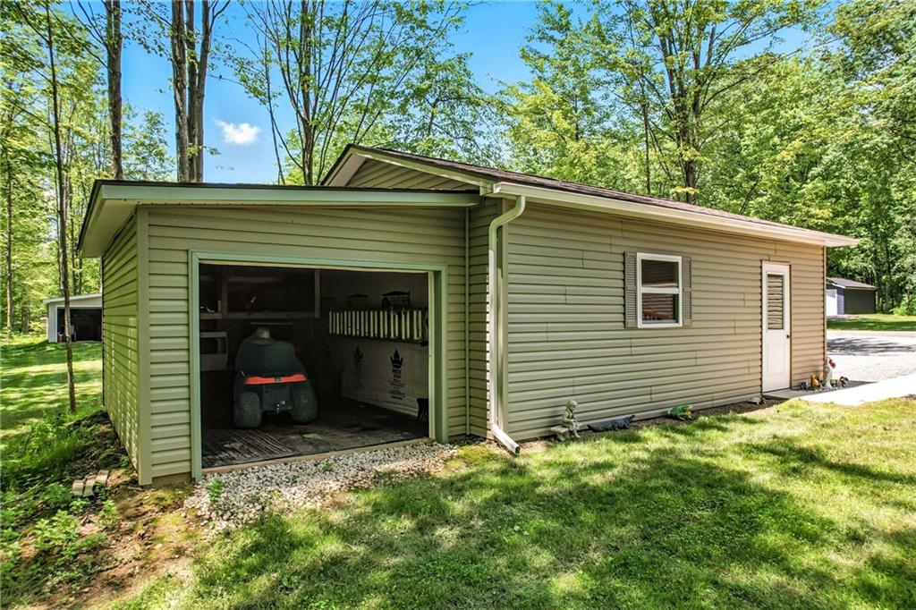 73 South Summit Road, Unit 503 Greenville, PA 16125 - Photo 27 of 36 Double car garage with extra storage behind it.