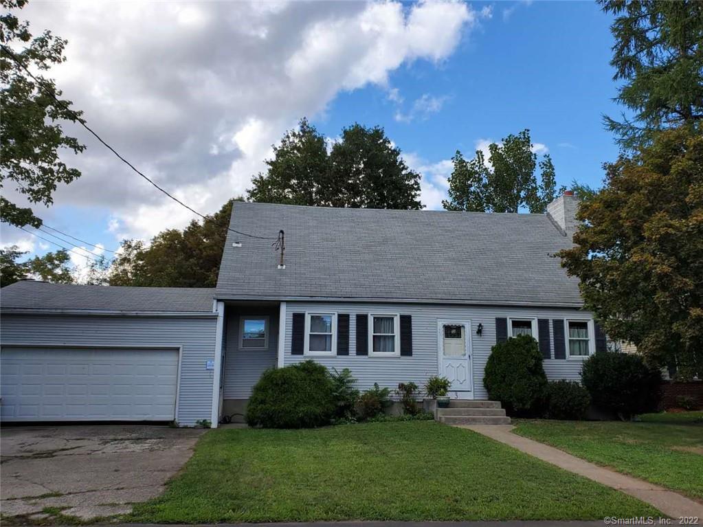 a view of a yard in front of a house