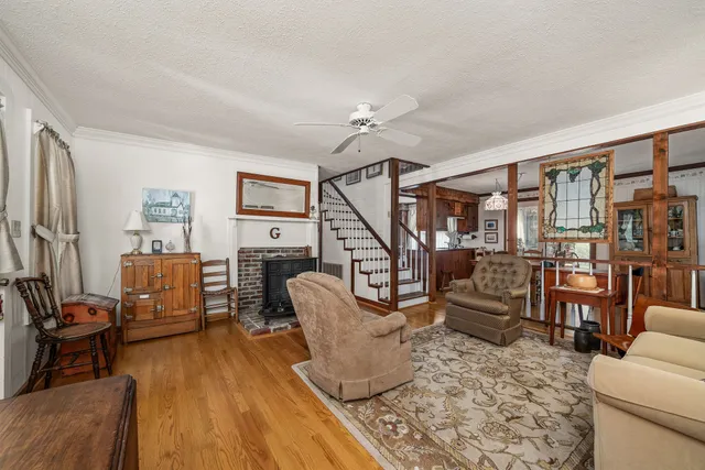 a kitchen with stainless steel appliances a stove a refrigerator and a microwave