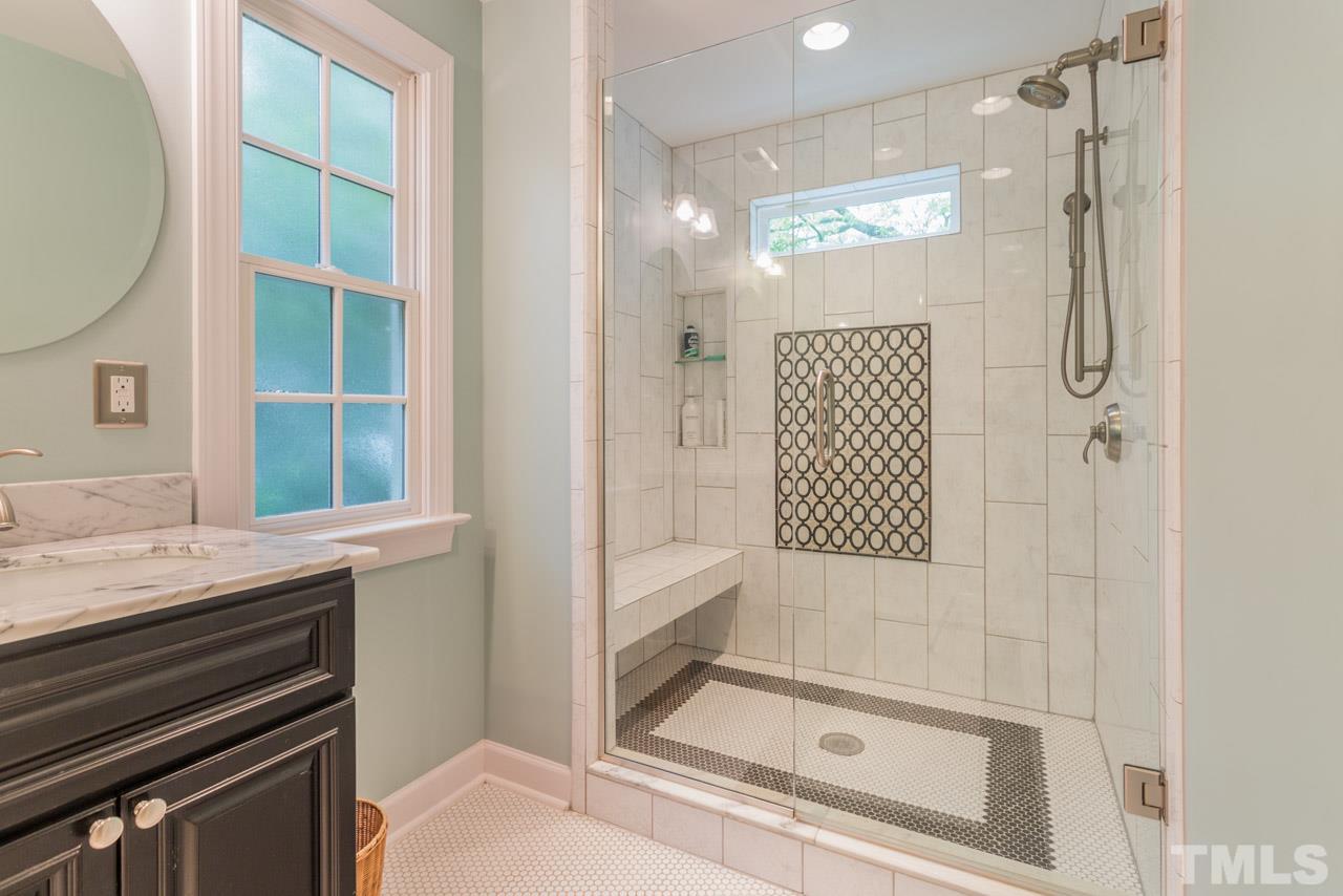 319 Furches Street Raleigh, NC 27607 - Photo 21 of 25 a bathroom with a shower