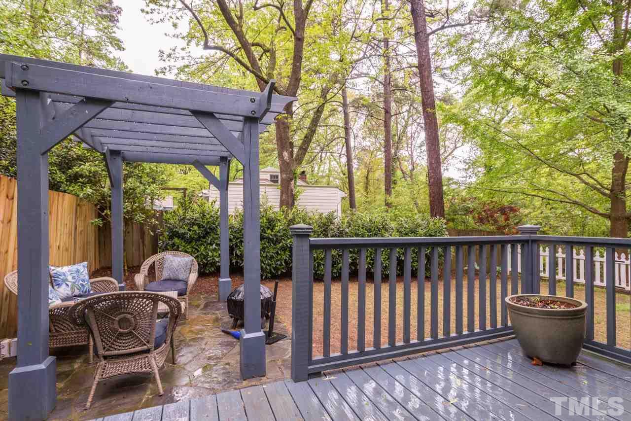 319 Furches Street Raleigh, NC 27607 - Photo 4 of 25 a view of a chairs and table in the patio