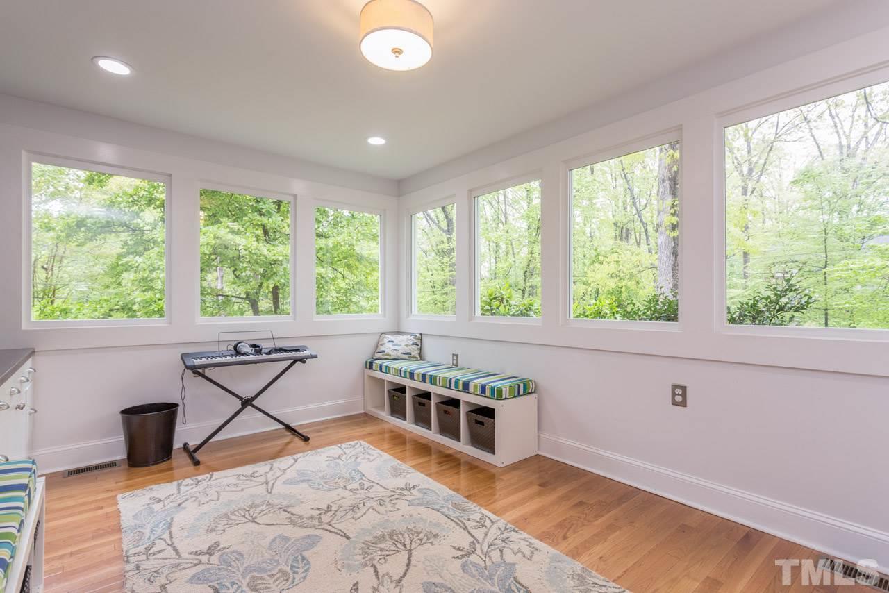 319 Furches Street Raleigh, NC 27607 - Photo 10 of 25 a room with a large window and furniture