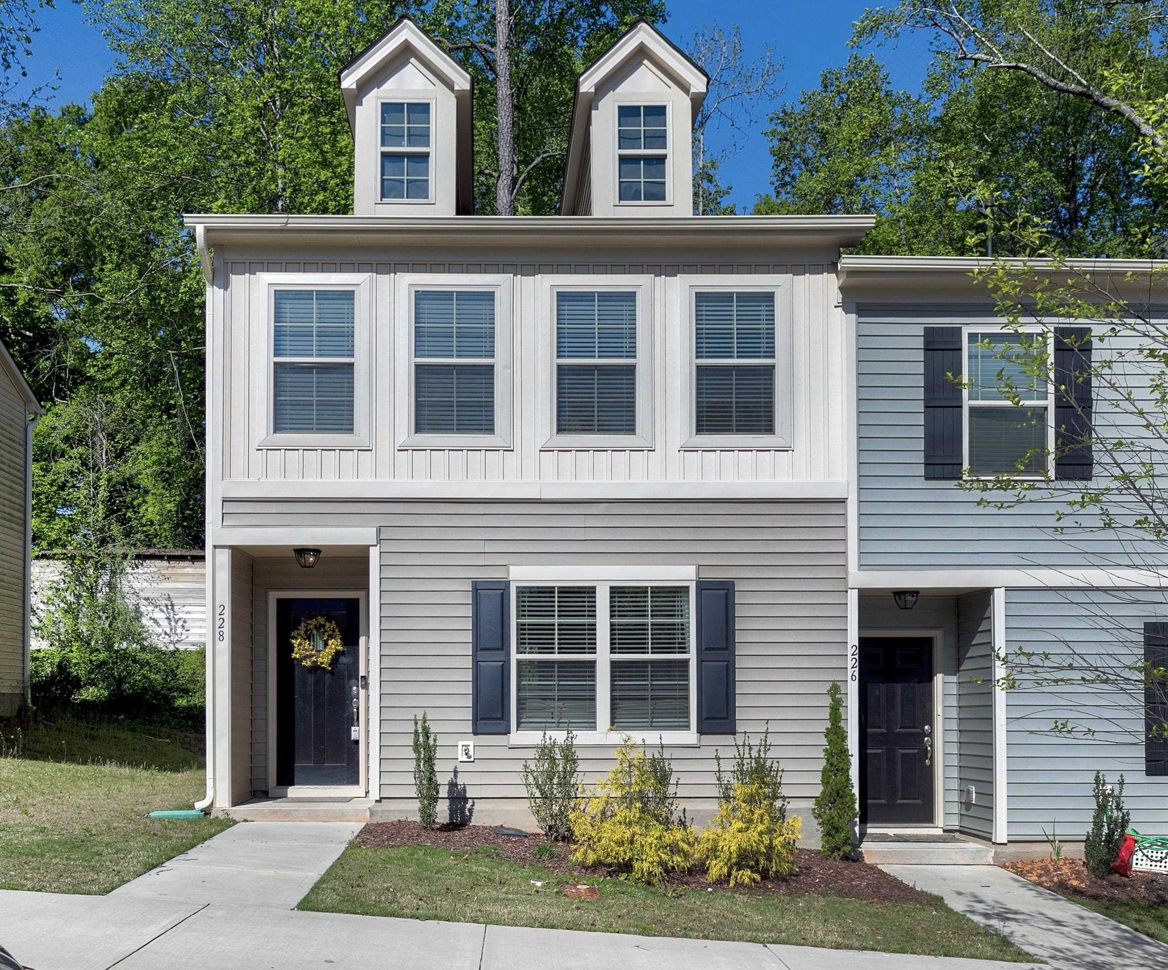 228 Spark Street Raleigh, NC 27606 - Photo 2 of 28 3 convenient assigned parking spaces per unit! Beautiful almost new end unit