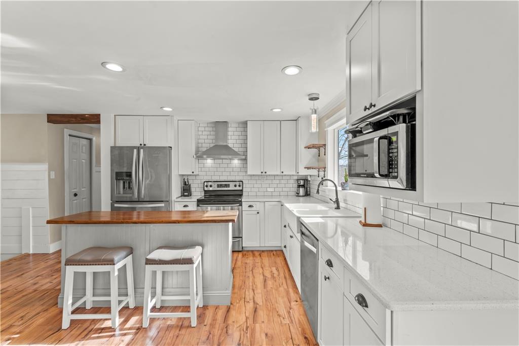 359 Hunting Creek Road Canonsburg, PA 15317 - Photo 14 of 39 a large kitchen with granite countertop lots of counter space and window