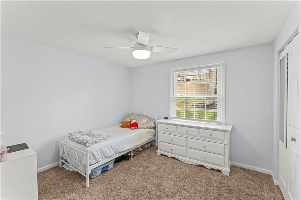 359 Hunting Creek Road Canonsburg, PA 15317 - Photo 16 of 39 a bedroom with a bed and a window