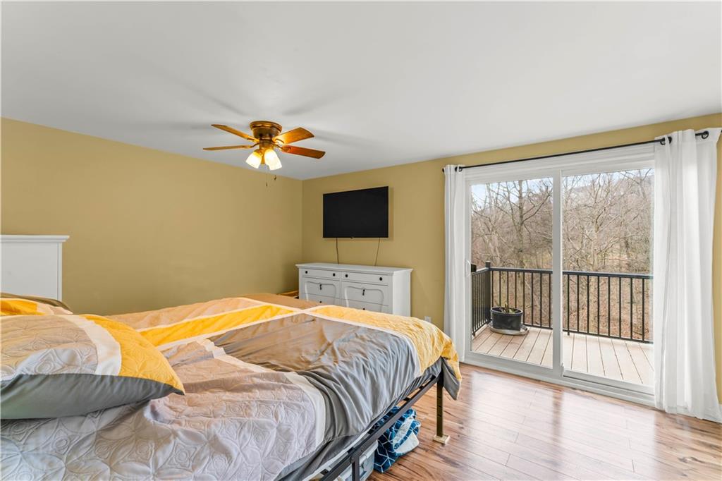 359 Hunting Creek Road Canonsburg, PA 15317 - Photo 20 of 39 a bedroom with a bed and a tv