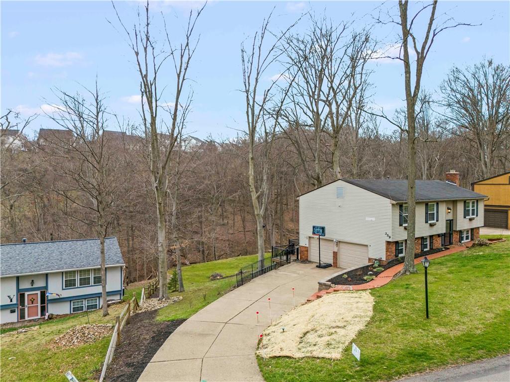 359 Hunting Creek Road Canonsburg, PA 15317 - Photo 2 of 39 a aerial view of a house with swimming pool and garden