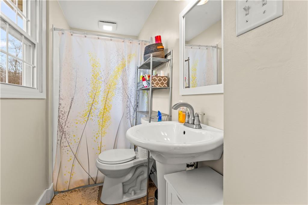 359 Hunting Creek Road Canonsburg, PA 15317 - Photo 22 of 39 a bathroom with a sink toilet and shower