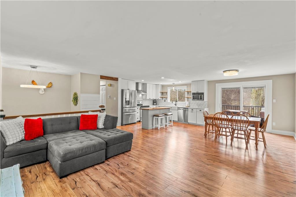 359 Hunting Creek Road Canonsburg, PA 15317 - Photo 9 of 39 a living room with furniture and wooden floor