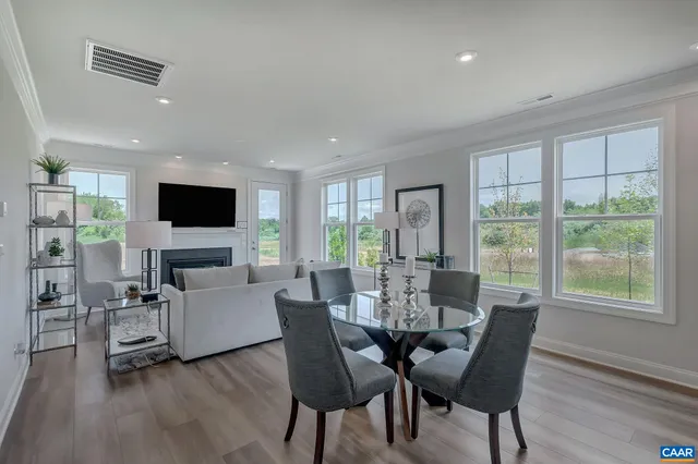 a view of entryway with wooden floor