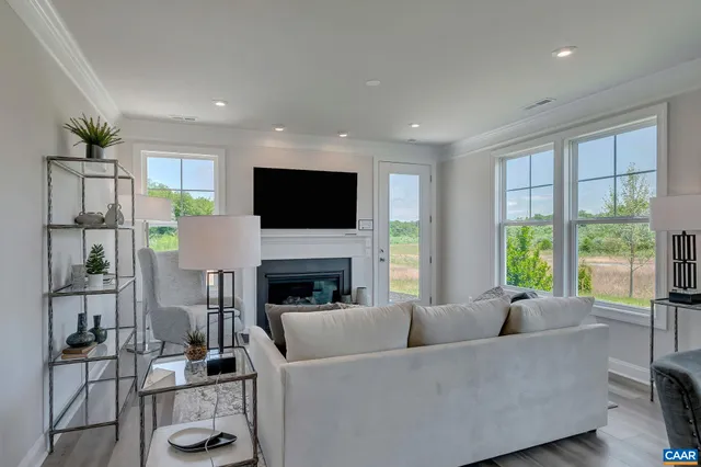 a workspace with furniture window and wooden floor