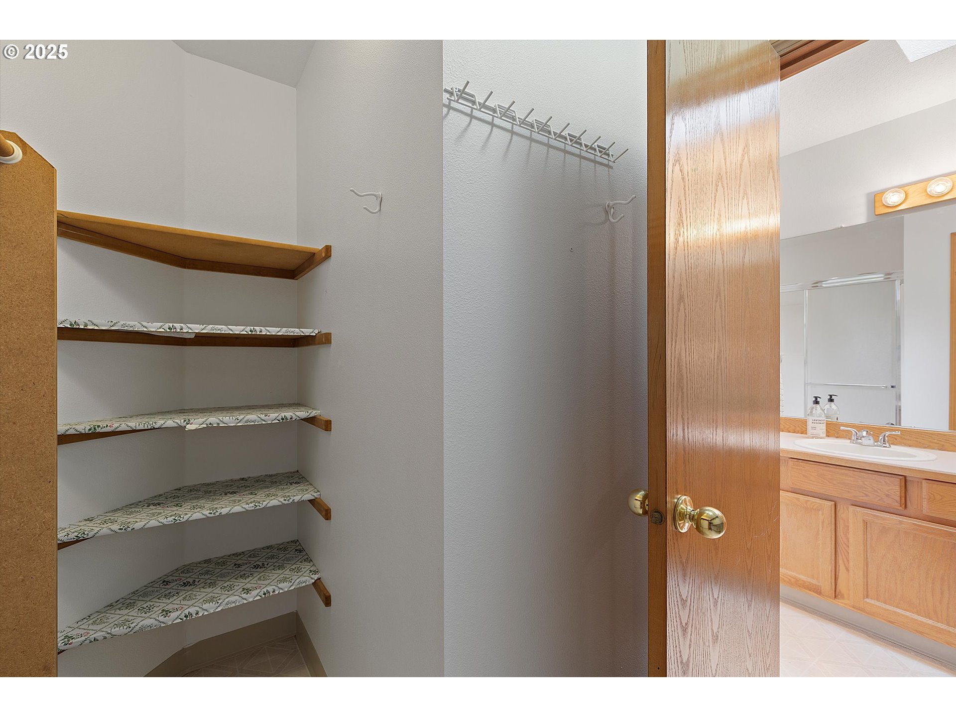 3475 Upper Drive Lake Oswego, OR 97035 - Photo 30 of 44 a bathroom with a sink and a mirror