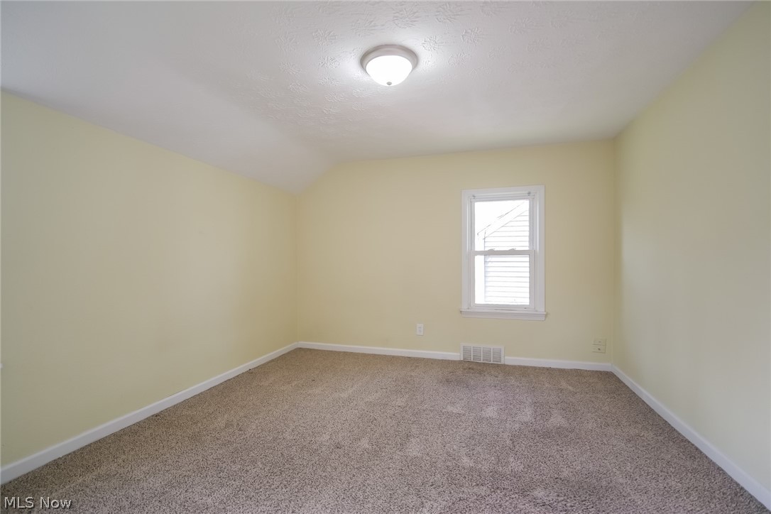 736 Quilliams Road Cleveland Heights, OH 44121 - Photo 17 of 20 Spare room featuring light carpet
