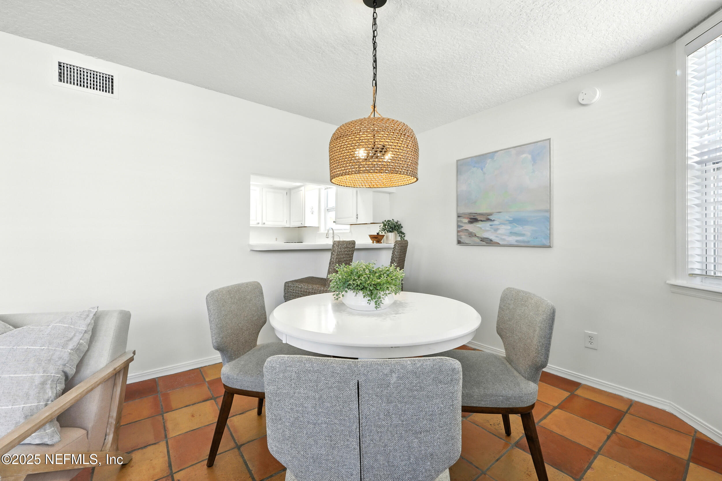 600 First Street Neptune Beach, FL 32266 - Photo 12 of 80 a dining room with furniture and window