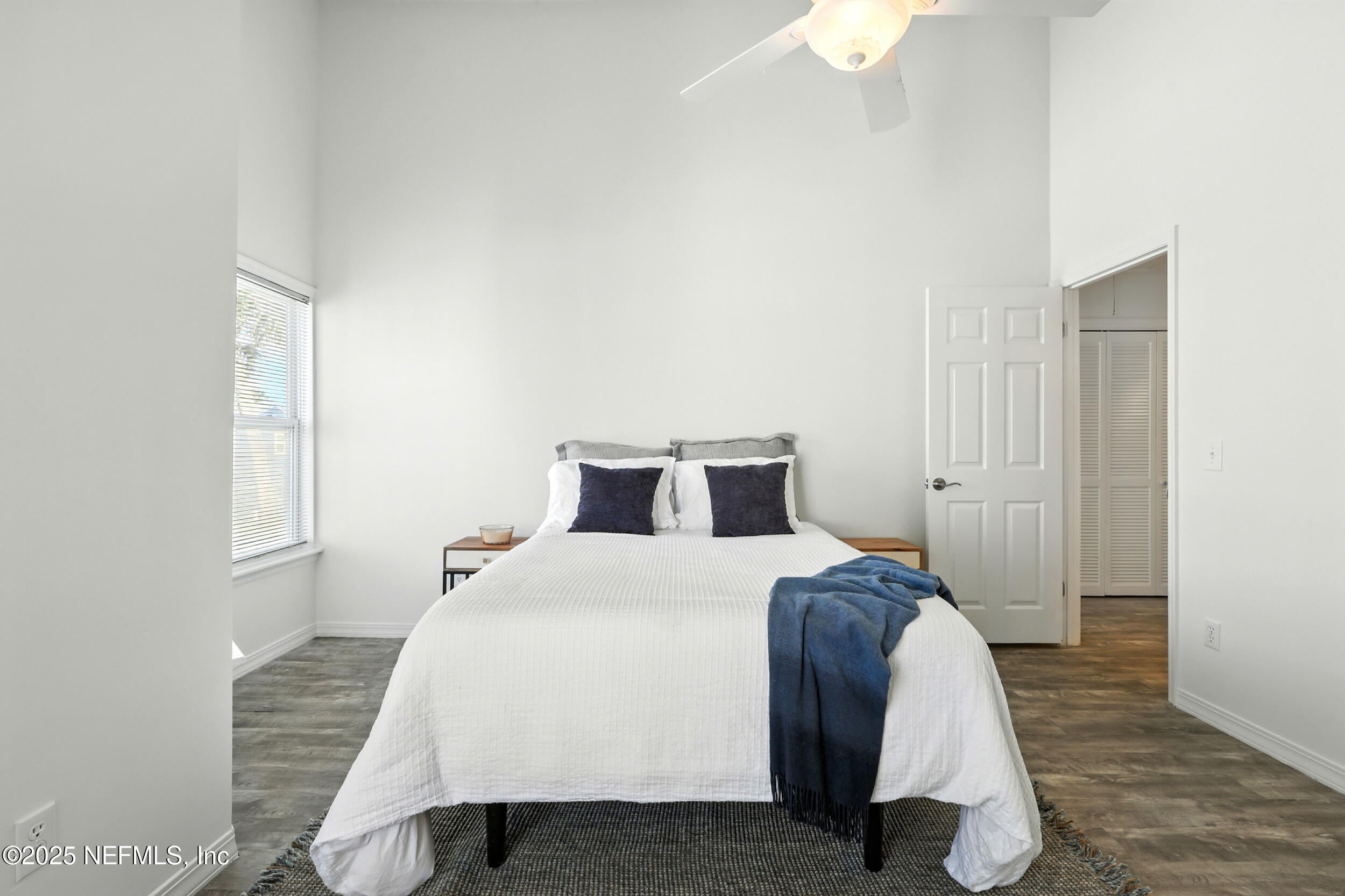 600 First Street Neptune Beach, FL 32266 - Photo 30 of 80 a bedroom with a bed and a window