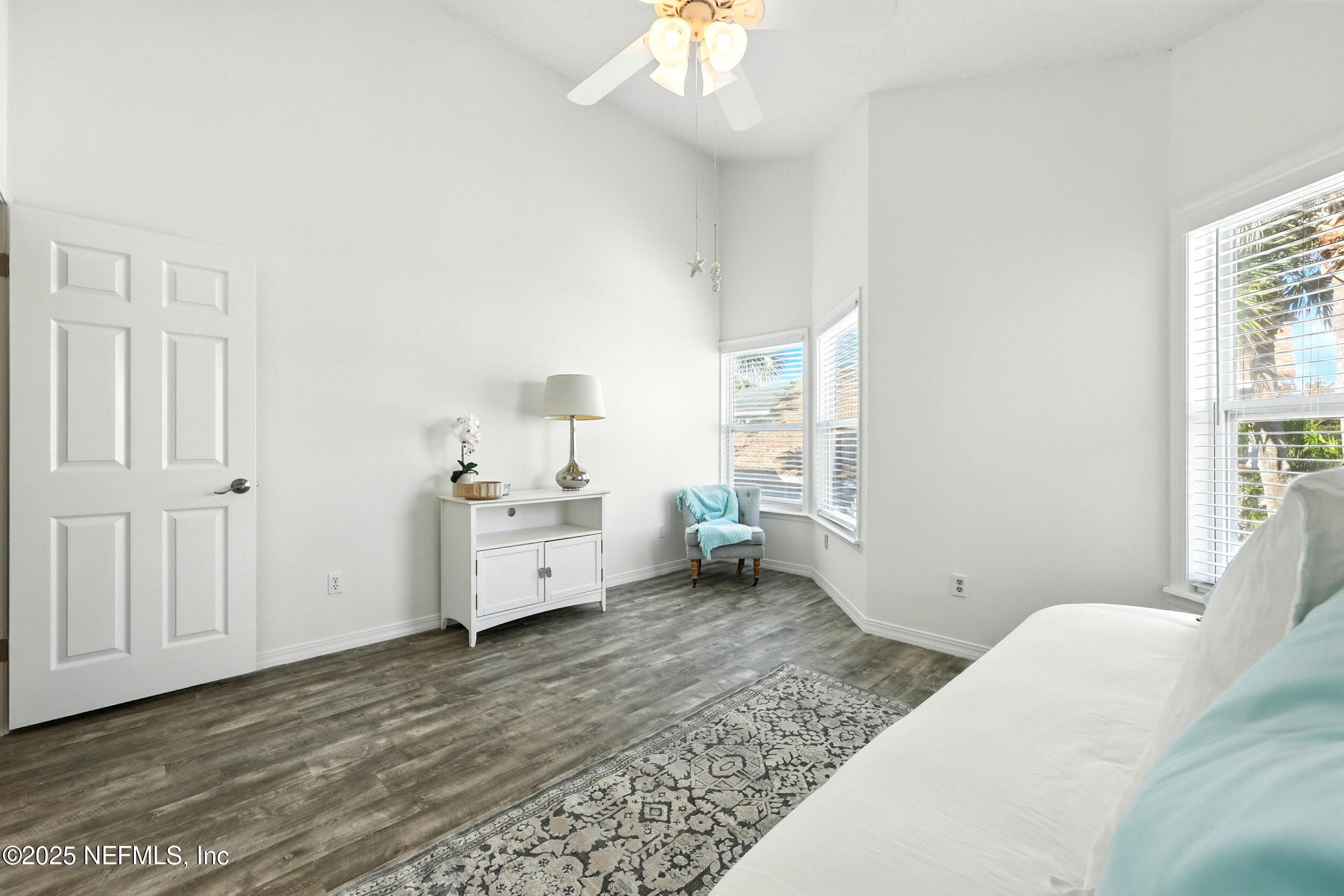 600 First Street Neptune Beach, FL 32266 - Photo 34 of 80 a view of a bedroom with furniture and windows