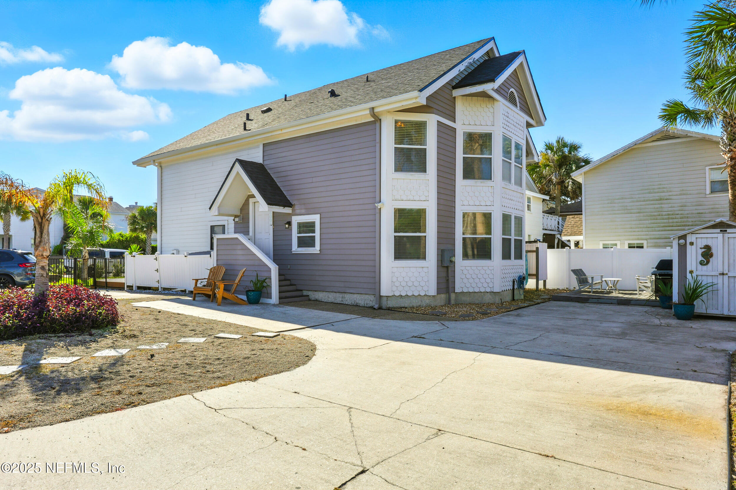 600 First Street Neptune Beach, FL 32266 - Photo 43 of 80 a view of a house with a patio