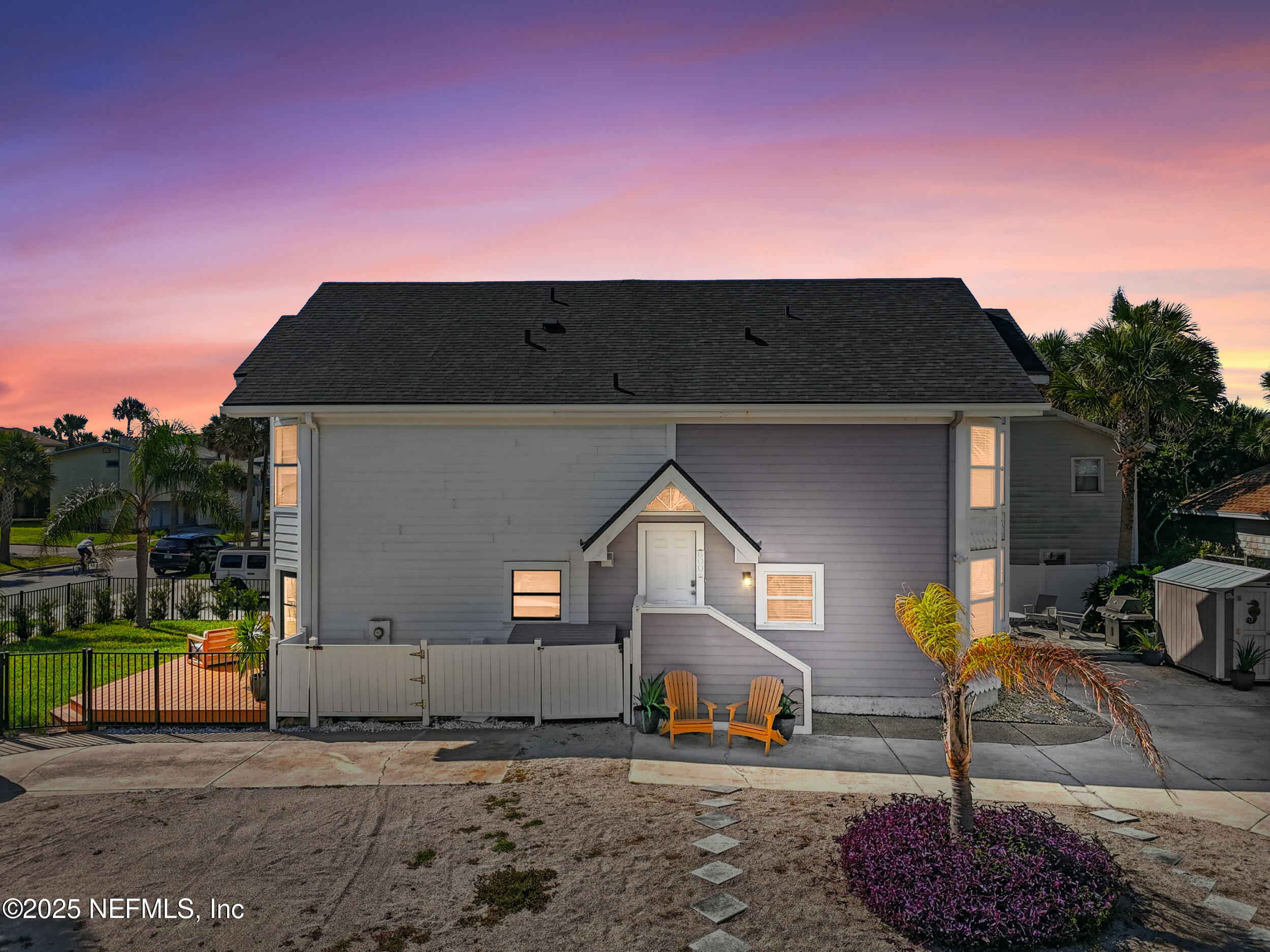 600 First Street Neptune Beach, FL 32266 - Photo 51 of 80 a front view of a house with a yard