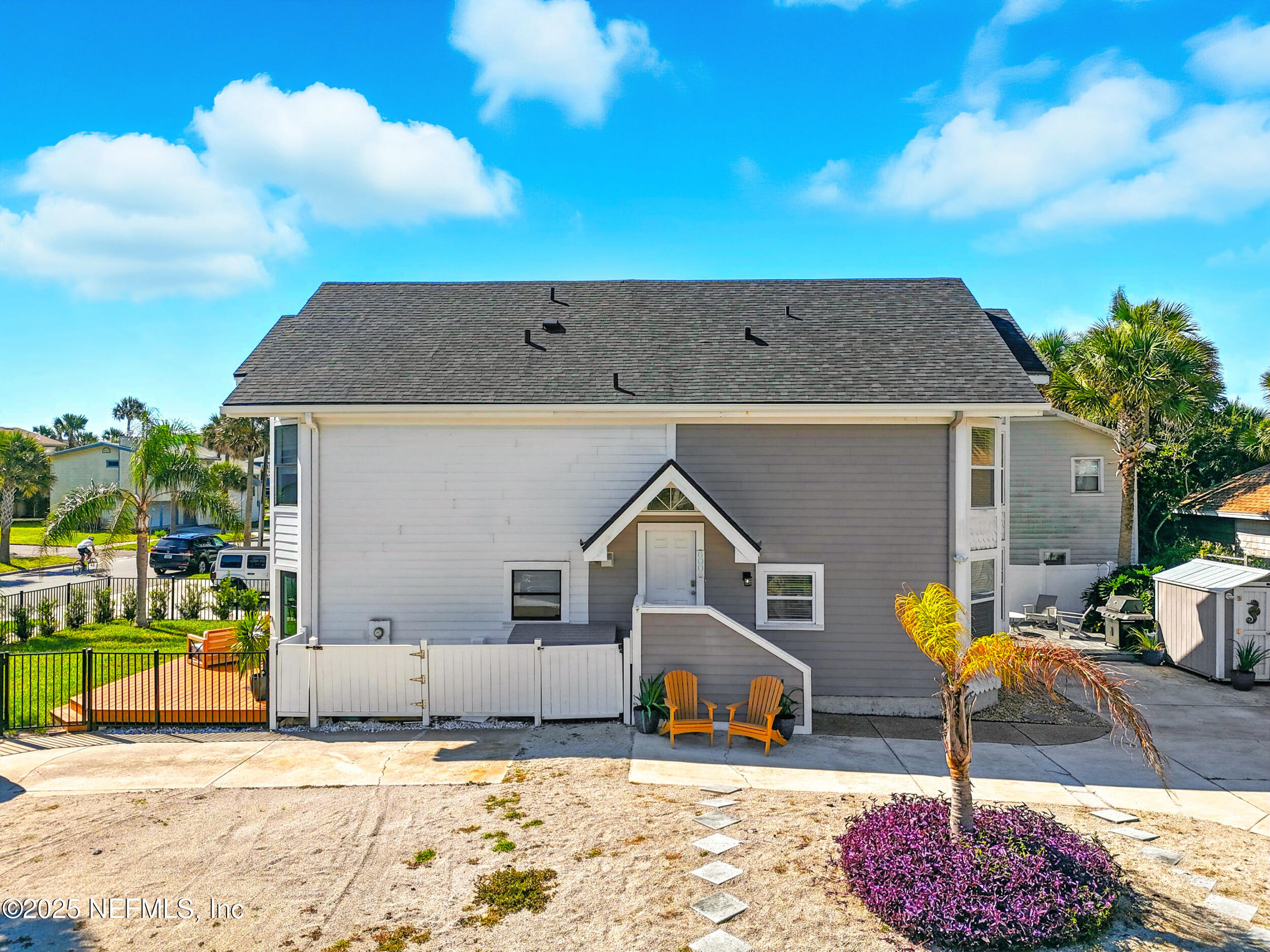 600 First Street Neptune Beach, FL 32266 - Photo 54 of 80 a front view of a house with a yard