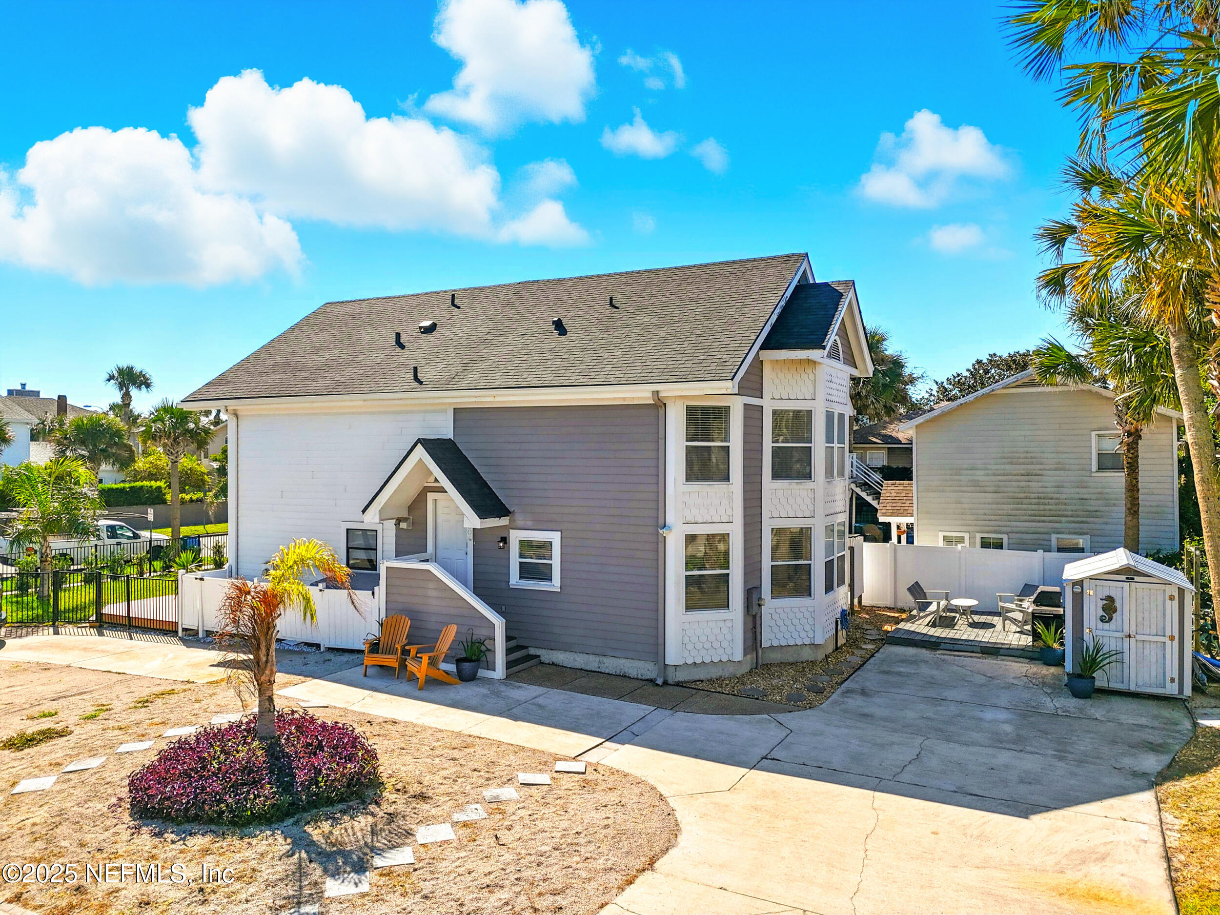 600 First Street Neptune Beach, FL 32266 - Photo 55 of 80 a view of a house with backyard