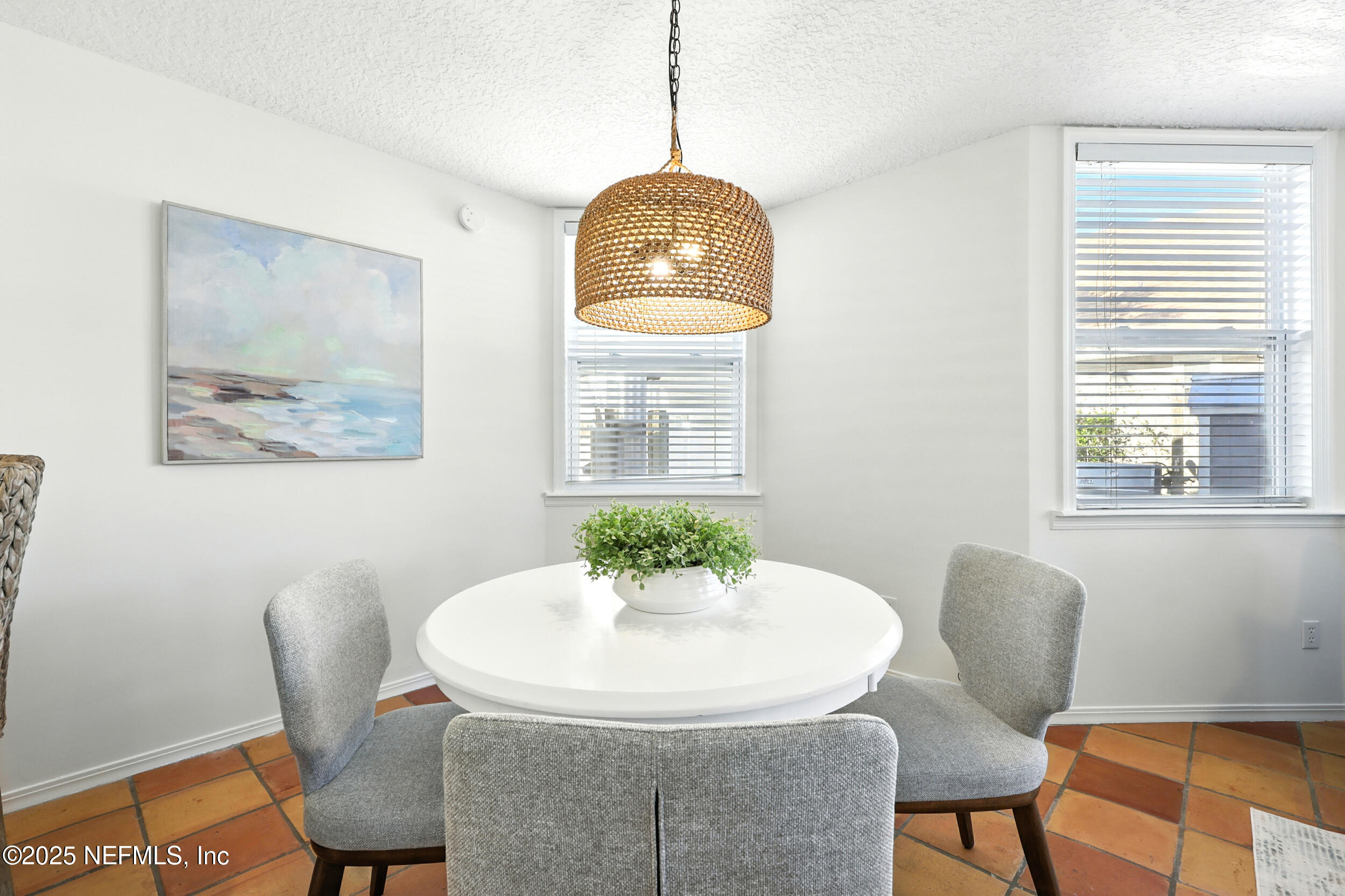 600 First Street Neptune Beach, FL 32266 - Photo 6 of 80 a dining room with furniture and window