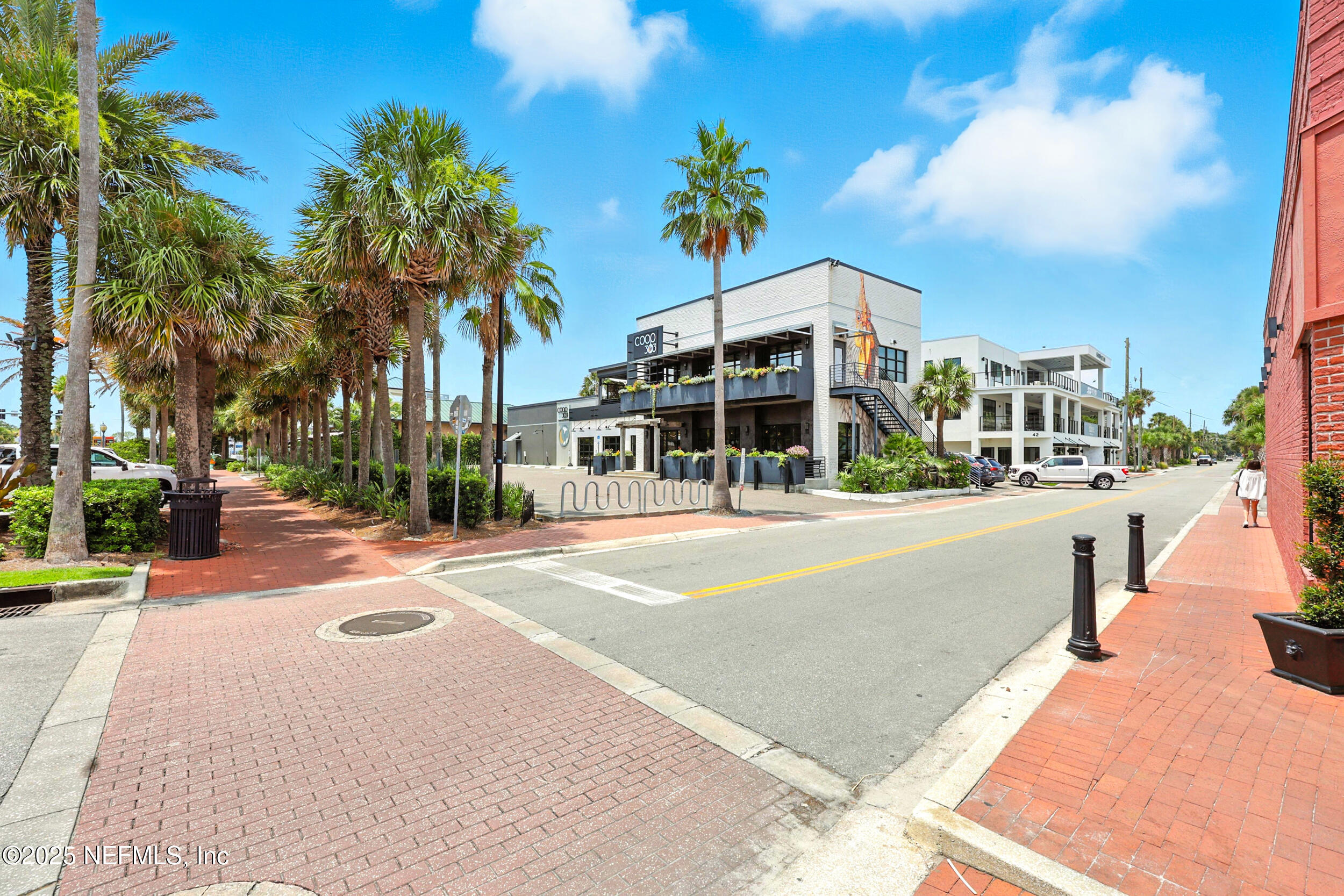 600 First Street Neptune Beach, FL 32266 - Photo 80 of 80 a view of a building with a yard