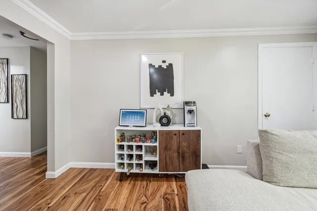 a bedroom with a bed and a book shelf
