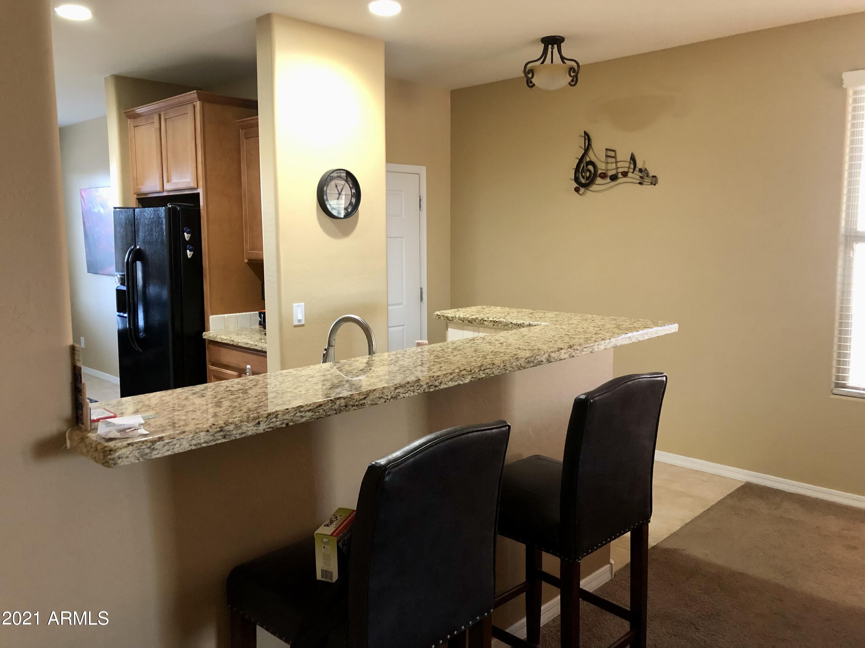 6566 West Mockingbird Way Florence, AZ 85132 - Photo 4 of 27 Kitchen Bar