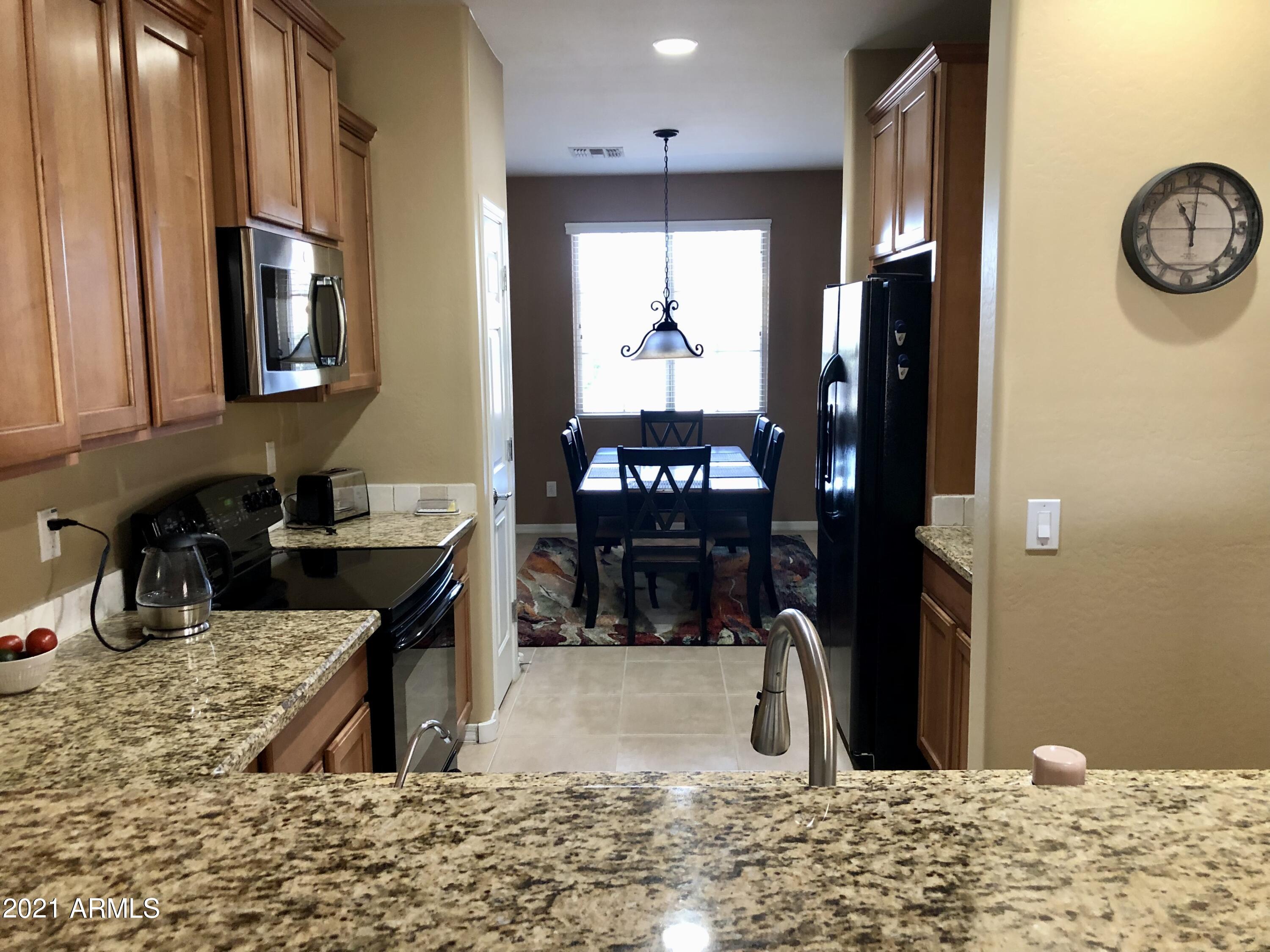 6566 West Mockingbird Way Florence, AZ 85132 - Photo 7 of 27 Kitchen