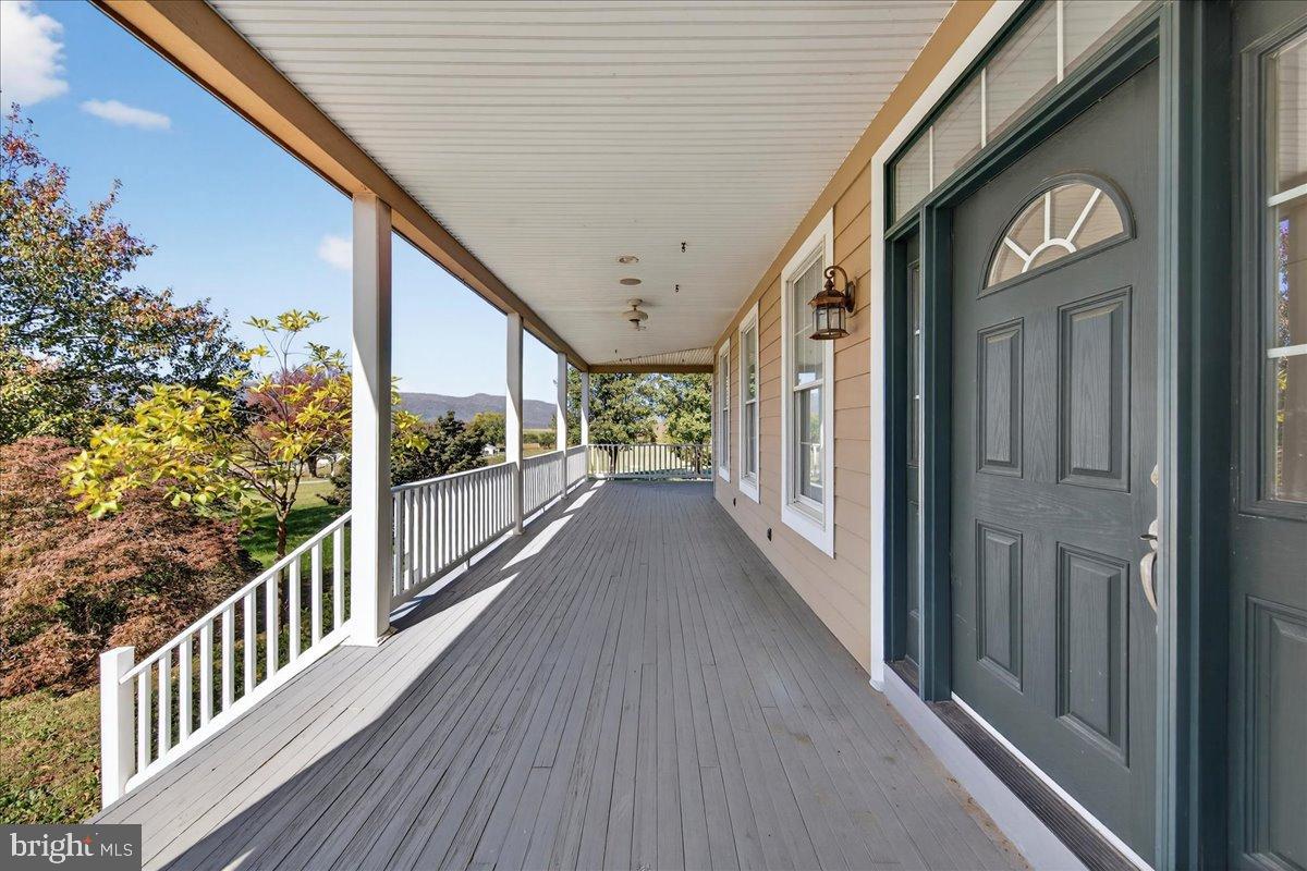 239 Mt Carmel Road Luray, VA 22835 - Photo 11 of 116 Inviting porch with scenic views ahead.