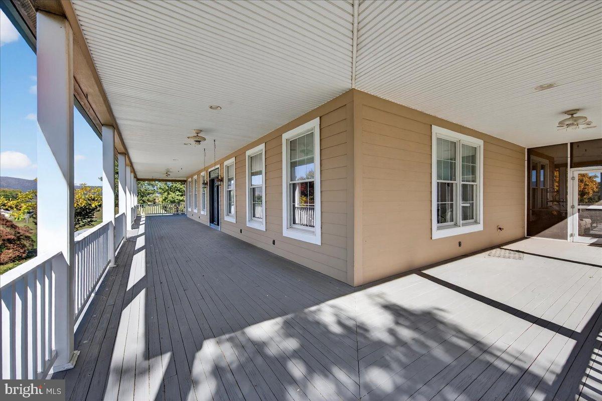 239 Mt Carmel Road Luray, VA 22835 - Photo 12 of 116 Spacious porch with scenic views awaits.