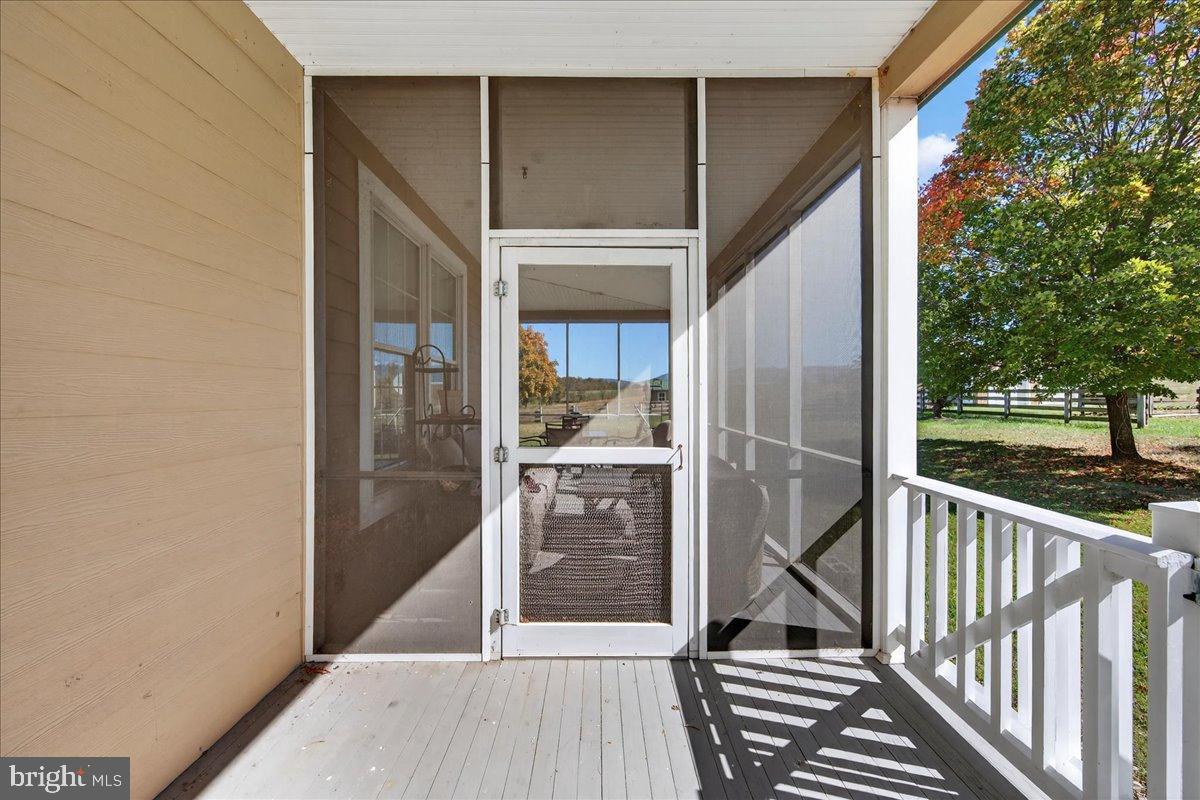 239 Mt Carmel Road Luray, VA 22835 - Photo 13 of 116 Inviting screened porch with serene views.