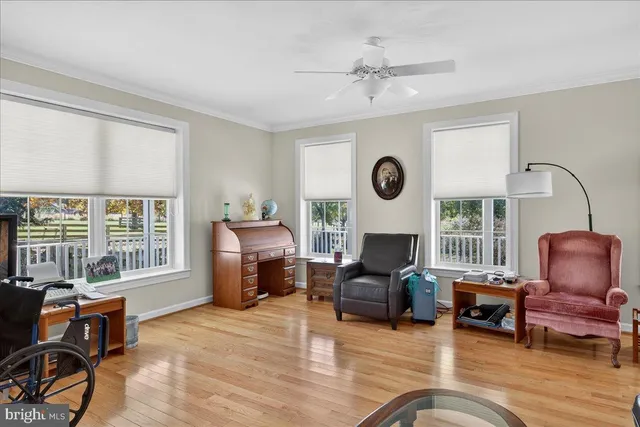 a spacious bathroom with a bathtub toilet and a shower