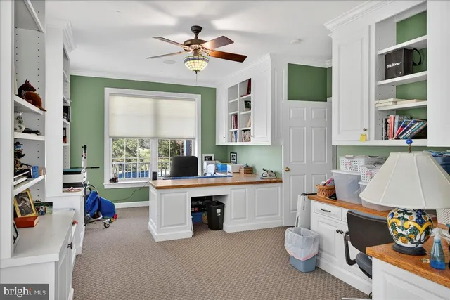 a room with a bed and a chandelier