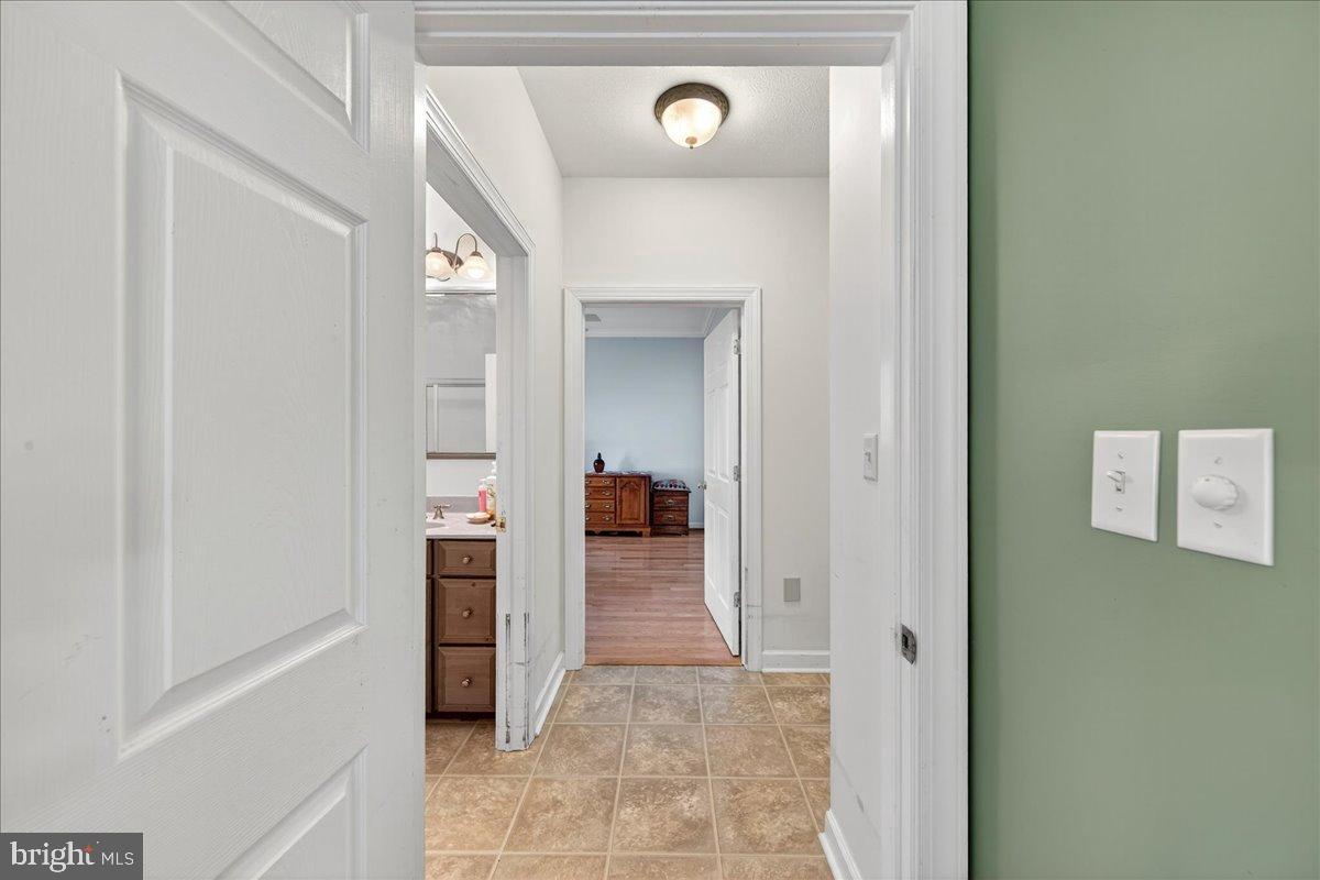239 Mt Carmel Road Luray, VA 22835 - Photo 27 of 116 a view of a hallway with wooden floor and a hallway