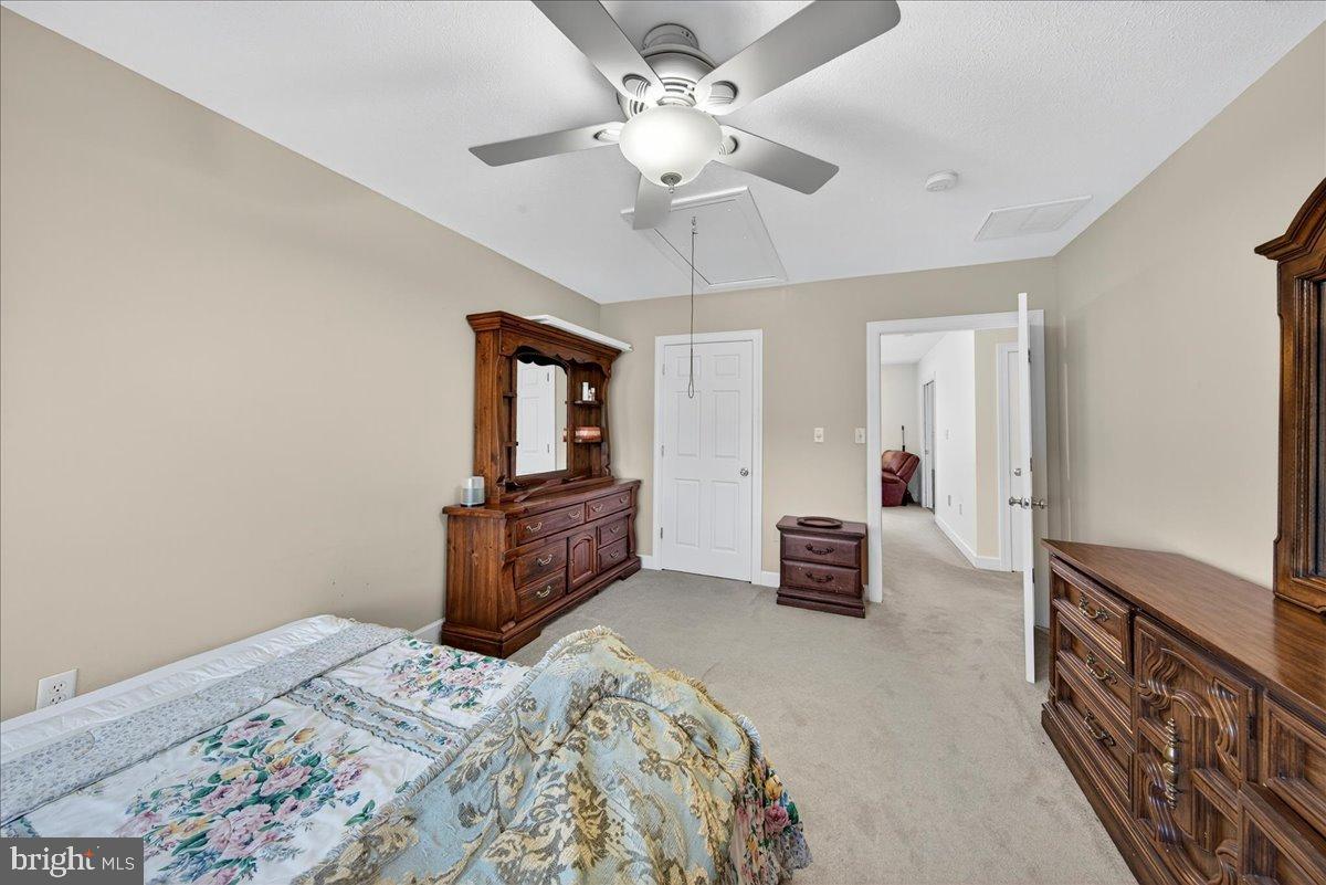 239 Mt Carmel Road Luray, VA 22835 - Photo 47 of 116 Serene bedroom with elegant wooden accents.