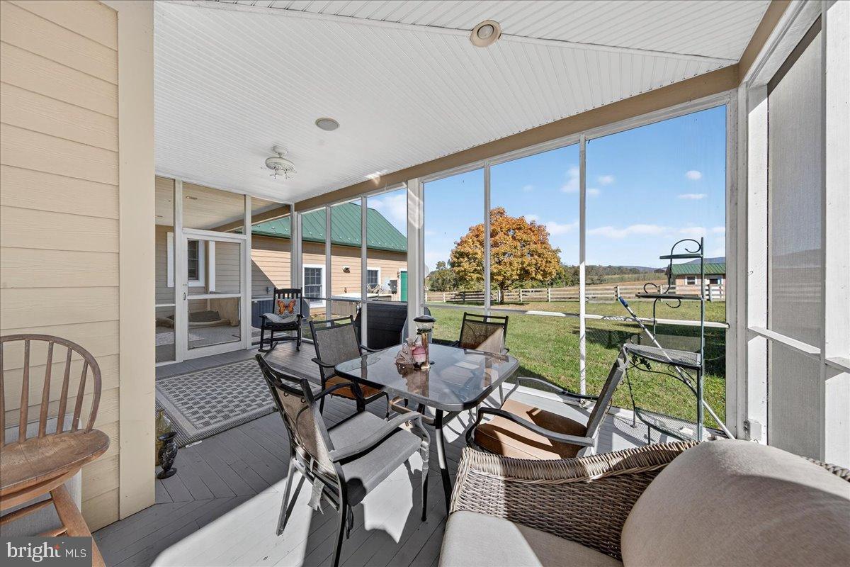 239 Mt Carmel Road Luray, VA 22835 - Photo 67 of 116 a view of a dining room with furniture window and outside view