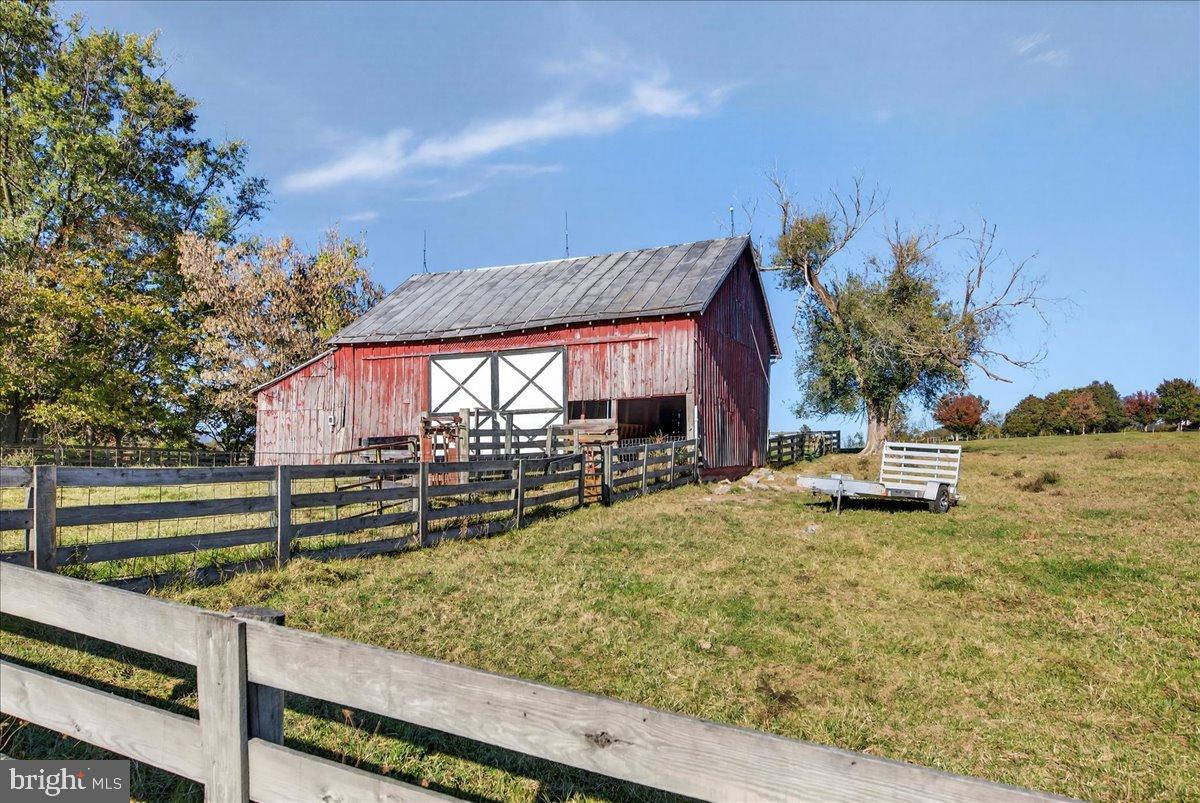 239 Mt Carmel Road Luray, VA 22835 - Photo 94 of 116 Charming red barn amidst serene pastures.