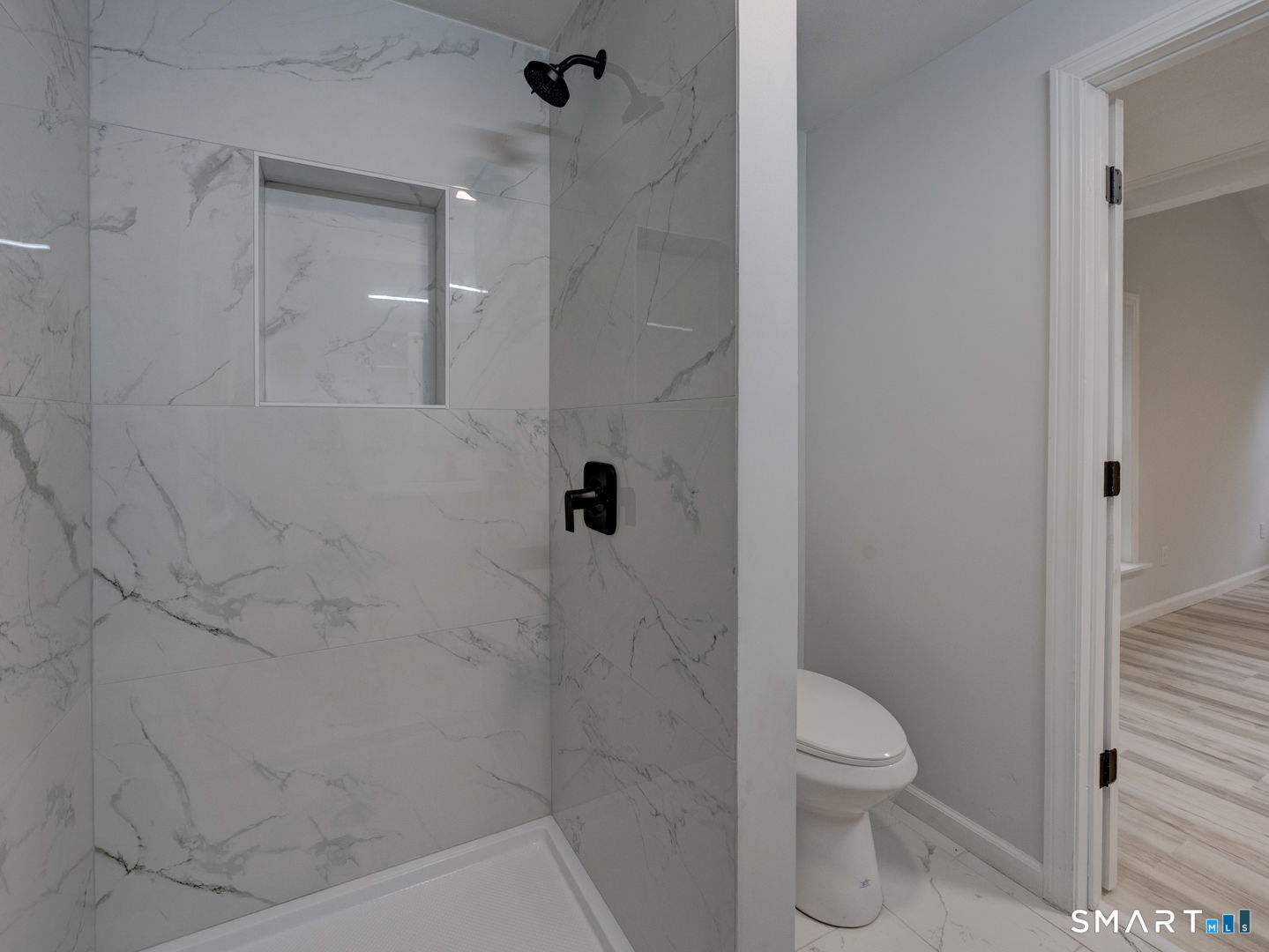 11 Cheshire Road Prospect, CT 06712 - Photo 16 of 38 a bathroom with a toilet and shower