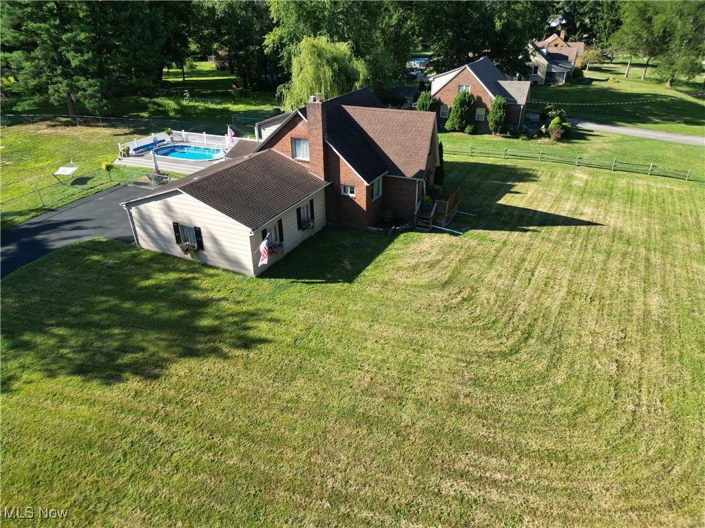 95 Clingan Road Struthers, OH 44471 - Photo 10 of 46 Aerial view of property featuring a pool
