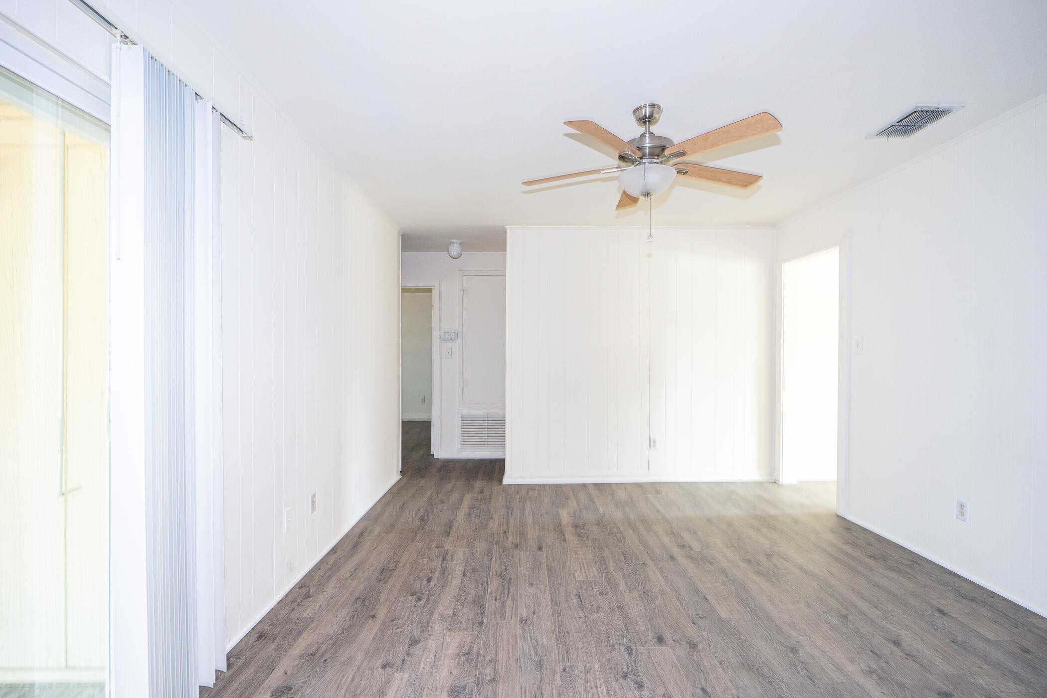 75 7th Street Shalimar, FL 32579 - Photo 5 of 19 a view of an empty room with window